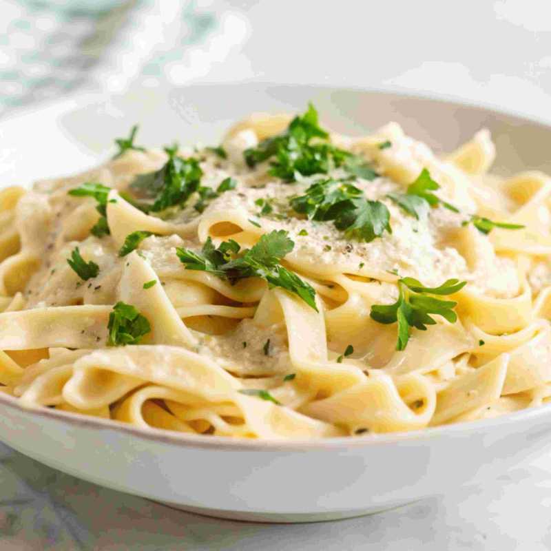 Creamy Garlic Alfredo White Pasta at Royal Cafe in City Center